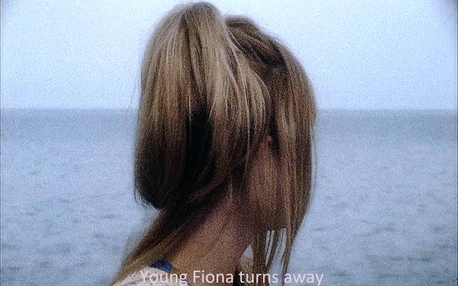 Young Fiona turns away.