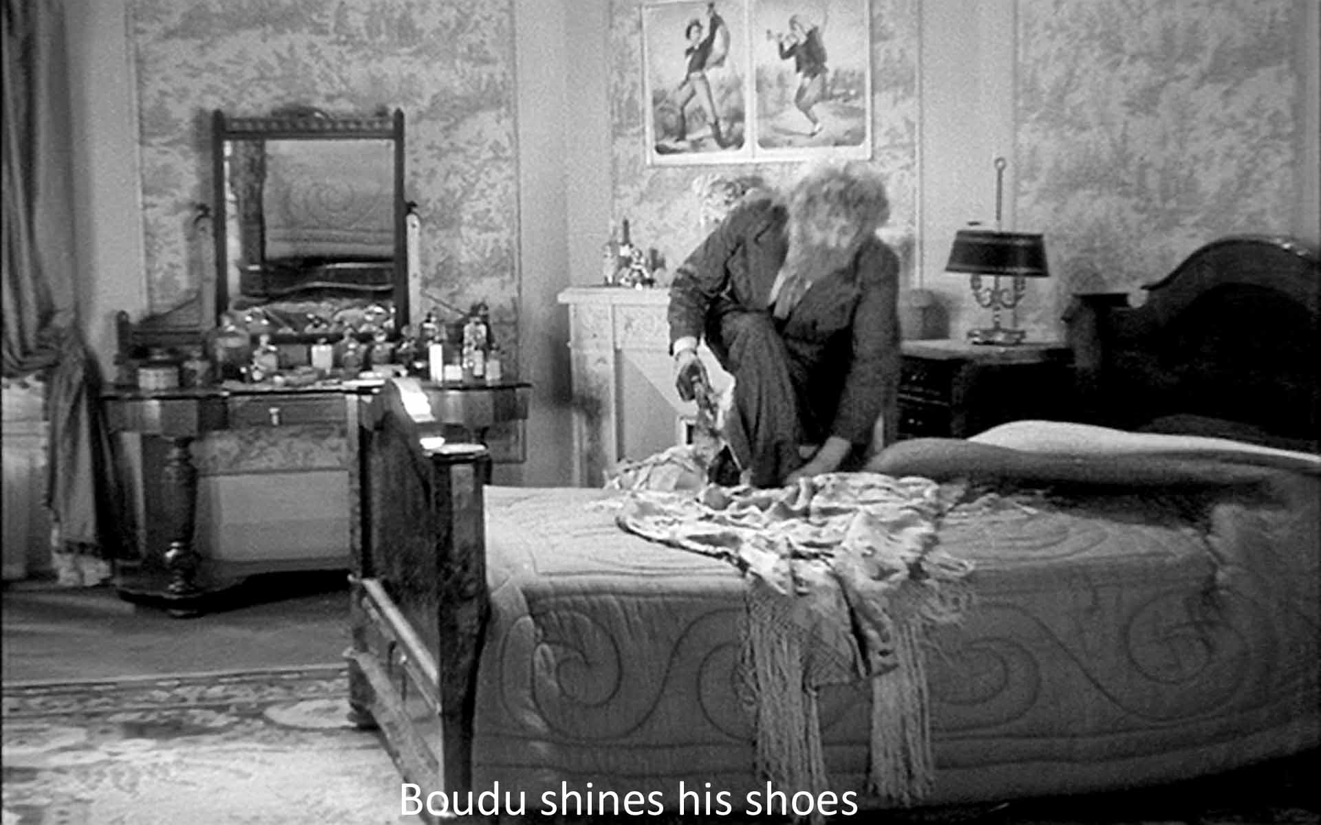 Boudu shines his shoes