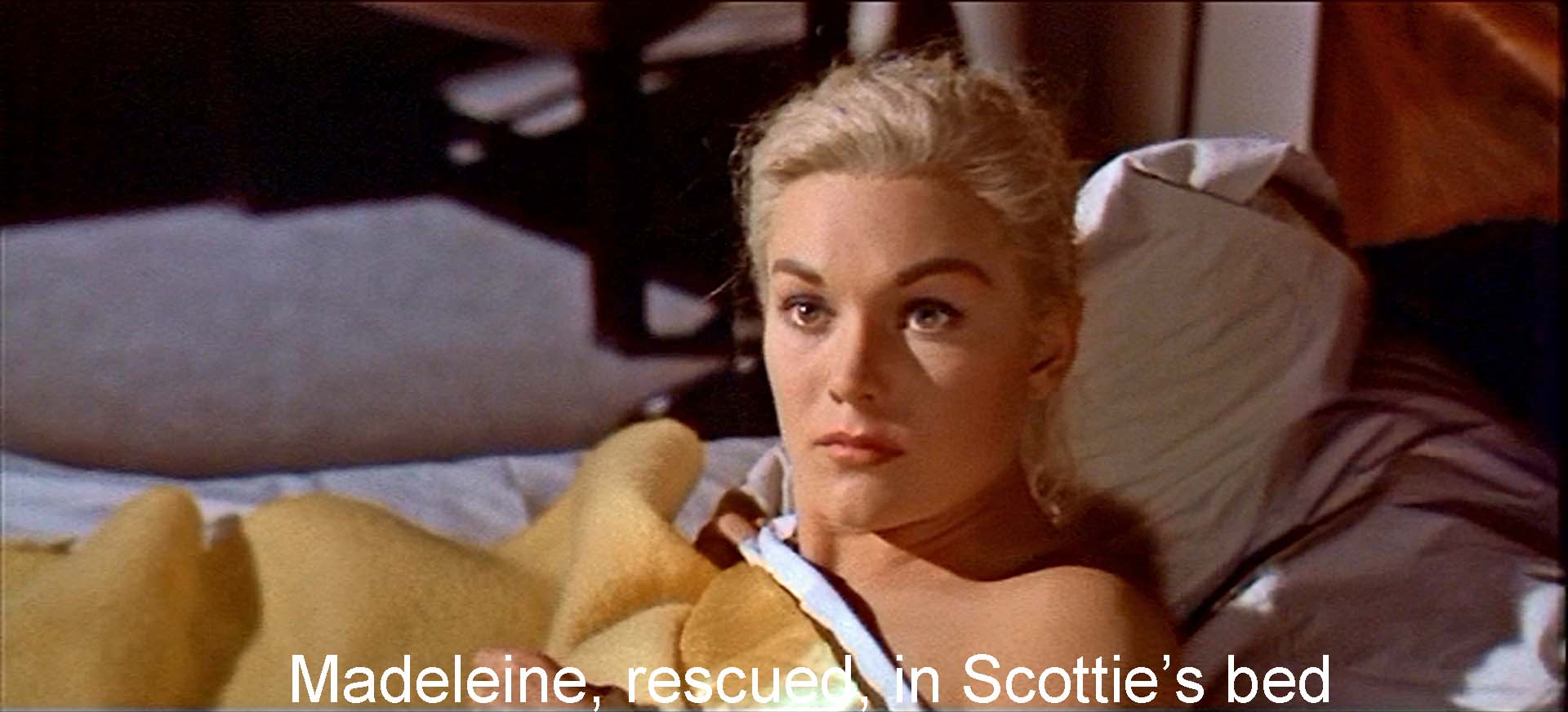 Madeleine, rescued, in Scottie's bed