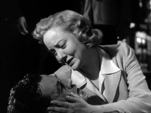  Julier cradles her beaten husband